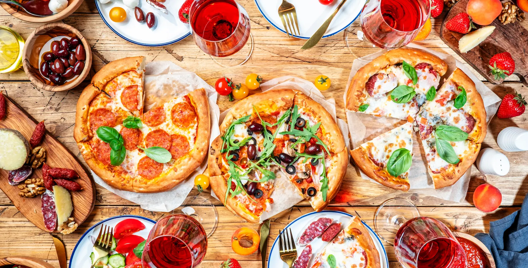 pizza party table top view glasses with red wine 2026 01 07 06 59 18 utc