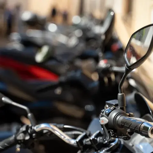 close-up-shot-of-a-lot-of-motorcycles-at-the-stree-2024-10-18-15-18-22-utc